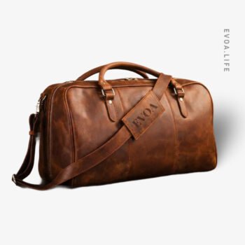 The Ultimate Travel Companion: Where Heritage Meets Horizon Crafted from 100% Genuine Crazy Horse Leather , this leather duffel bags isn’t just luggage, it’s a legacy. Whether you’re catching a morning flight from Dhaka or heading out for a weekend by the lake, its oil pull-up finish ages beautifully, telling the story of every mile you travel. Spacious enough for a 15.6” laptop and all your essentials, it offers understated luxury for the journey that demands more.