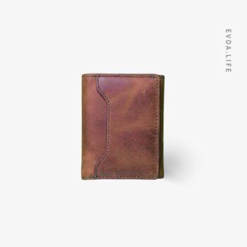 Leather Trifold Short Wallet is the ultimate comfort zone for fans of minimalist and slim designs. It neatly organizes your cards and cash without creating any uncomfortable bulk in your pocket. The premium leather provides a soft, flexible feel that ensures a stress-free carry all day long. Perfectly suited for both formal pants and casual jeans, it maintains a sleek silhouette. Ultimately, it offers a smart and sophisticated way to keep your essentials secure and easily accessible.
