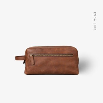 Handcrafted from full-grain leather, the Pouch Bag is a minimal, secure home for your phone, wallet, and keys. Its adjustable strap allows for flexible waist or chest wear, while the premium leather develops a unique patina over time. Every stitch and zipper is designed for durability and ease, moving with you without adding bulk.