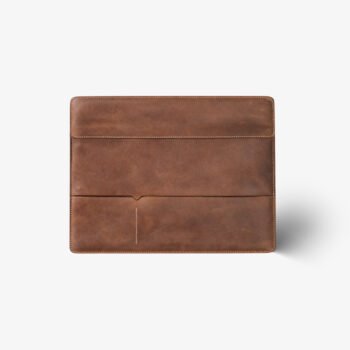 Built for serious workdays, this full-grain leather laptop bags combines clean design with lasting durability. The structured body protects your laptop while aging beautifully over time. A padded main compartment, space for daily essentials, sturdy top handles, and a detachable shoulder strap offer comfort, flexibility, and a confident professional presence wherever work takes you