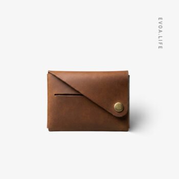 Fold Mini Wallet | The vegetable-tanned Leather Fold Mini Wallet is the ultimate comfort zone for fans of minimalist and slim designs. It neatly organizes your cards and cash without creating any uncomfortable bulk in your pocket. The premium leather provides a soft, flexible feel that ensures a stress-free carry all day long. Perfectly suited for both formal pants and casual jeans, it maintains a sleek silhouette. Ultimately, it offers a smart and sophisticated way to keep your essentials secure and easily accessible.