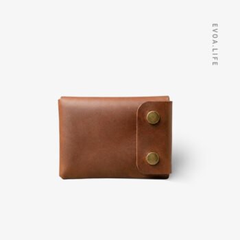 Fold Mini Wallet | The vegetable-tanned Leather Fold Mini Wallet is the ultimate comfort zone for fans of minimalist and slim designs. It neatly organizes your cards and cash without creating any uncomfortable bulk in your pocket. The premium leather provides a soft, flexible feel that ensures a stress-free carry all day long. Perfectly suited for both formal pants and casual jeans, it maintains a sleek silhouette. Ultimately, it offers a smart and sophisticated way to keep your essentials secure and easily accessible.