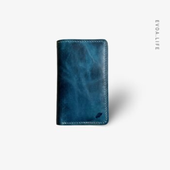 Pre-order only. Handcrafted semi-long wallet in dark green vegetable-tanned leather. Built with purpose—coin pocket, card slots, cash compartments, and document space. Each piece made on demand, aged to become uniquely yours.
